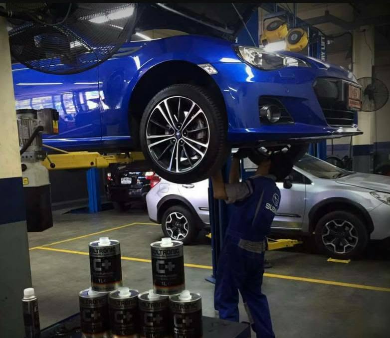 Vehicle maintenance work at Perkins Auto